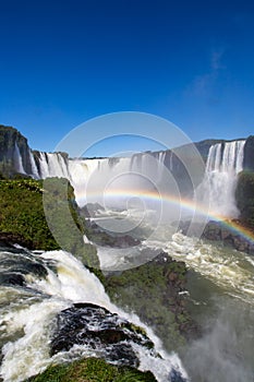 Amazing National Park of Iguazu Falls with a full rainbow over the water, Foz do IguaÃÂ§u, Brazil