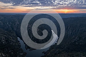 Amazing natural landscape with a panoramic view of the Douro River at sunset. From the Fraga do Puio viewpoint in the north of Por