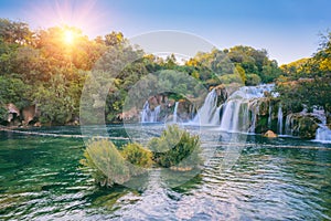 Amazing nature landscape, famous waterfall Skradinski buk at sunrise, Croatia, outdoor travel background