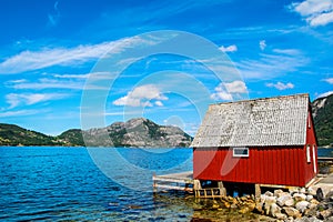 Amazing nature view with beautiful houses on the shore of the fjord. Location: Forsand, Norway, Europe. Artistic picture. Beauty