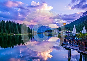 Amazing nature view of Misurina Lake and mountain range during a beautiful sunset. Location: Lake Misurina, Dolomites Alps, South