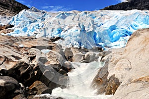 Amazing Nigardsbreen glacier in mountains