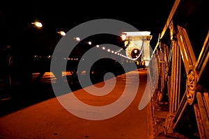 Amazing night view of the illuminated Chain Bridge close-up. Beautiful vintage lantern. Budapest