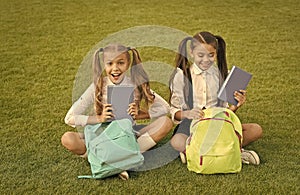 Amazing outdoor library. Happy children pick up library books. Lending library. School library. Literature and language