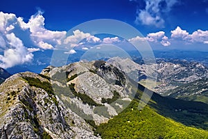 Amazing panorama green mountains and blue sky in Montenegro. Mou