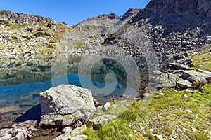 Amazing panorama of Lake and reflection of Preokorets Popova Kapa peak, Rila Mountain