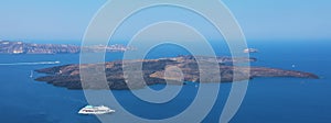 Amazing panoramic banner view from Santorini Island with the caldera of volcano and cruise ships in the Mediterranean sea, Greece