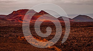 Amazing panoramic landscape of volcano in Timanfaya national park. Popular touristic in Lanzarote island Canary islans Spain.