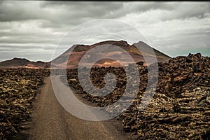 Amazing panoramic landscape of volcano in Timanfaya national park. Popular touristic in Lanzarote island Canary islans Spain.