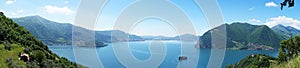 Amazing panoramic from `Monte Isola` with Lake Iseo. Italian landscape. Island on lake. View from the island Monte Isola on Lake I