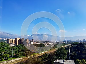 Amazing panoramic view or landscape of the city of Medellin in Colombia, with skybuildings and parks of el poblado town