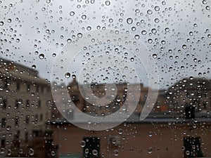 An amazing photography of some waterdrops over the window