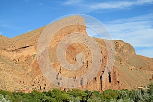 Amazing red mountain and green froest at the bottom