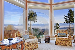 Amazing rich interior with stunning window view on mountains