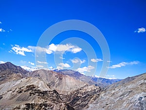 Amazing scenery of the mountains with blue sky and clouds