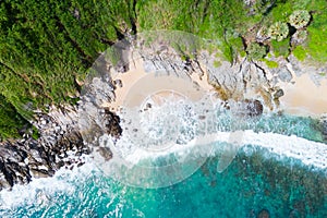 Amazing Sea aerial view Top down seashore nature background Beautiful Tropical beach with rocky mountains and turquoise clear