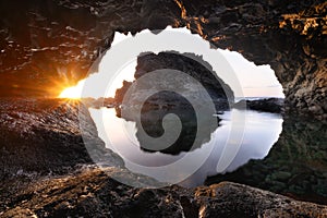 Amazing Sea Cave landscape at Sunset. Nature Photography background.