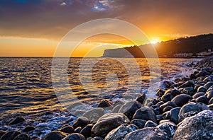 Amazing seascape in golden evening light at sunset