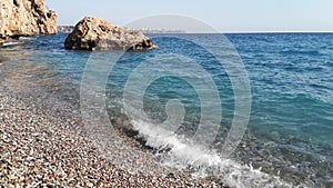 Amazing seascape with rock on the Konyaalti Beach in Antalya, Turkey - 12s