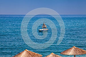 Amazing seashore landscape with old skiff