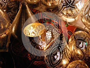 Amazing Shining lanterns in khan el khalili souq market with Arabic handwriting on it in egypt cairo photo