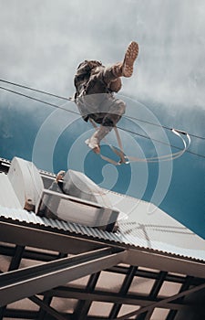 Amazing shot of an airborne forces soldier landing in a mission zone