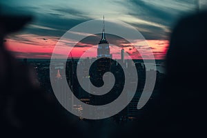 Amazing shot of the Empire State Building and the cityscape at sunset