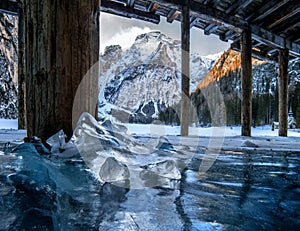 Amazing shot from frozen Pragser Wildsee lake and the snowy landscapes in South Tyrol, Italy