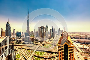 Amazing skyline cityscape with modern skyscrapers. Downtown of Dubai at sunny day during sunrise, United Arab Emirates