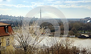 Amazing skyline view of Belgrade with a cable-stayed Ada bridge and the Sava river on the background on spring day. Banner