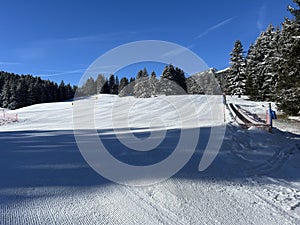 Amazing sport-recreational snowy winter tracks for skiing and snowboarding in the area of the tourist resorts