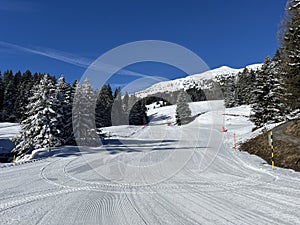 Amazing sport-recreational snowy winter tracks for skiing and snowboarding in the area of the tourist resorts