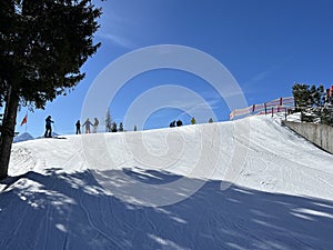 Amazing sport-recreational snowy winter tracks for skiing and snowboarding in the area of the tourist resorts