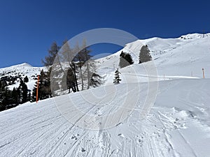 Amazing sport-recreational snowy winter tracks for skiing and snowboarding in the area of the tourist resorts