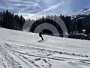 Amazing sport-recreational snowy winter tracks for skiing and snowboarding in the area of the tourist resorts