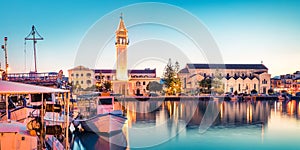 Amazing spring sunset in Zakynthos city. Beautiful evening panorama of town hall and Saint Dionysios Church, Ionian Sea, Zakynthos