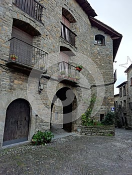 Amazing stone street and house in the spanish village photo