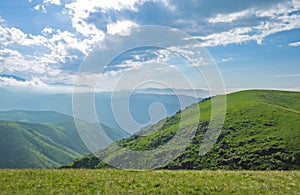 Amazing summer landscape, view to the green hills and beautiful sky