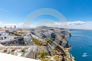 Amazing summer vacation background in Santorini. White houses and blue sea view from caldera. Luxury holiday in Greek coast.