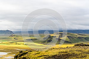 Amazing summer view from the Dyrholaey peninsula at 120metres above sea level towards the Icelandic interior photo