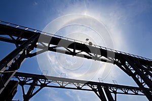 Amazing sun halo above bridge