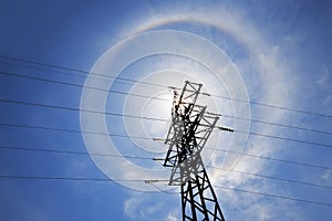 Amazing sun halo above power supply network