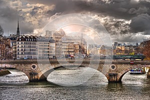 Amazing sunlight above of the Pont Louis-Philippe