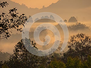 Amazing Sunrise Over Misty Landscape. Scenic View Of Foggy Morning Sky With Rising Sun Above Misty