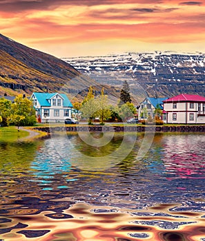 Amazing sunrise on small fishing town - Seydisfjordur.