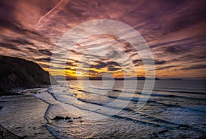 Amazing sunset at Barrika beach, Basque Country. Bay of Biscay, Spain photo