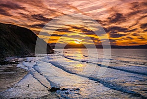 Amazing sunset at Barrika beach, Basque Country. Bay of Biscay, Spain photo