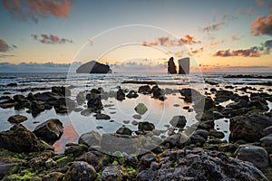 Amazing sunset at the beach of Mosteiros with its islets, Azores Sao Miguel island, Portugal. Sunset landscape over the sea at the
