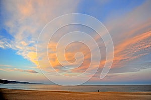 Amazing sunset on the beach of Nazare