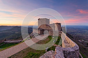 Amazing sunset at Castle Marvao, a small picturesque village in the Alentejo, Portugal. Panoramic view landscape. This landmark is